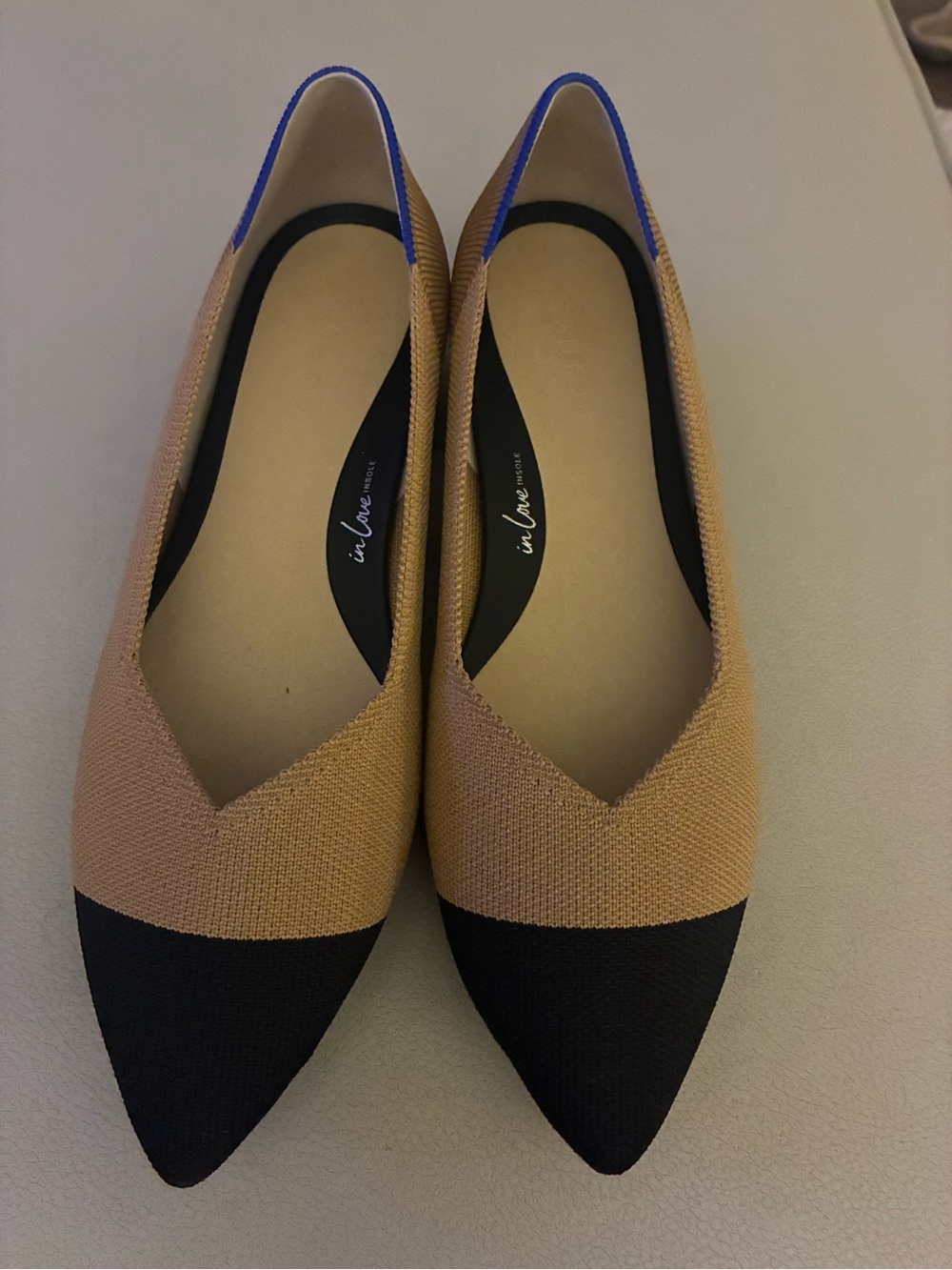 Rothy's Two-Tone Pointed Flats in Tan, Black and Blue Trim